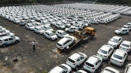 HANGZHOU, CHINA - SEPTEMBER 09: Aerial view of nearly a thousand electric cars parked at an open area in Xiacheng District on September 9, 2019 in Hangzhou, Zhejiang Province of China. Most of them are BAIC Beijing Electric Vehicle Company (BJEV) cars and have been used as shared cars. (Photo by Zhu Yinwei/VCG via Getty Images)
