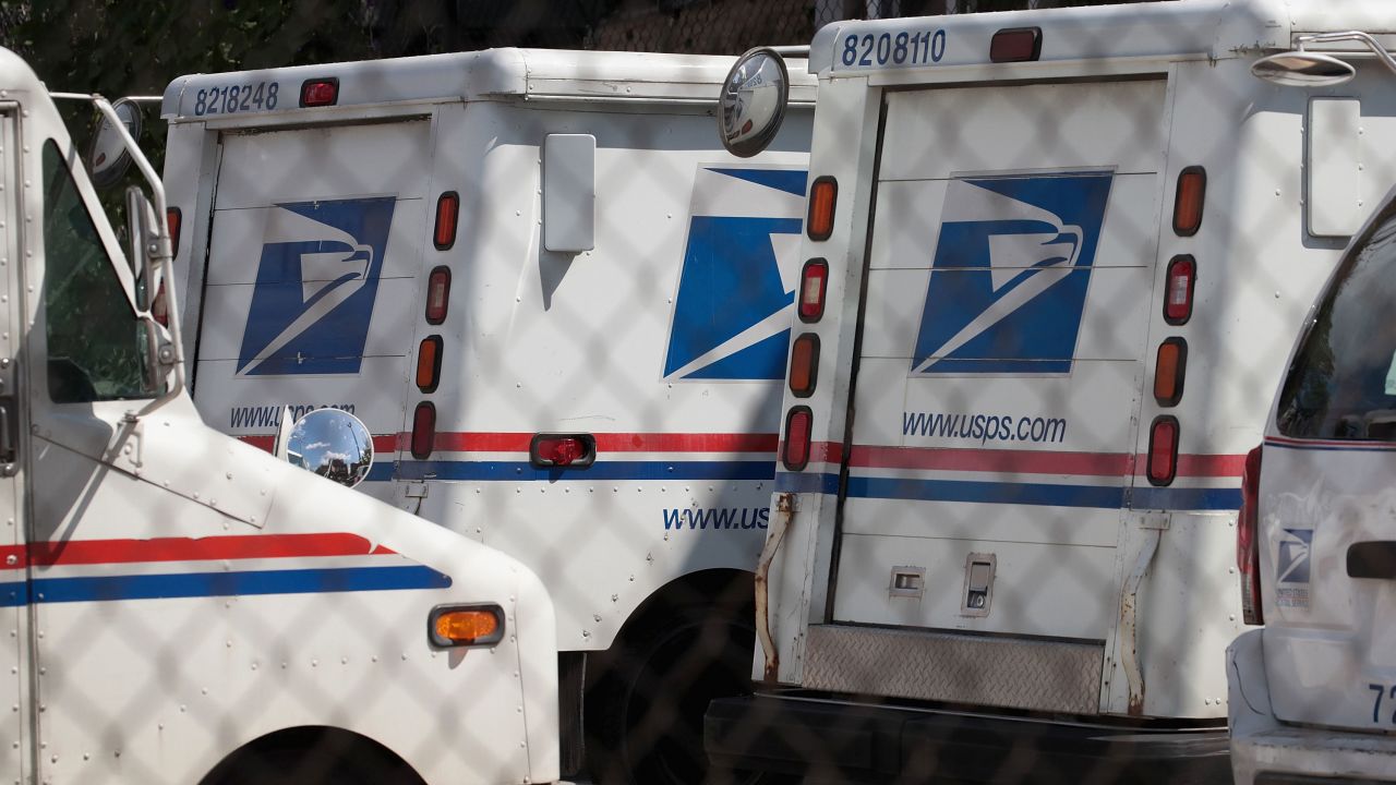 01 usps trucks FILE
