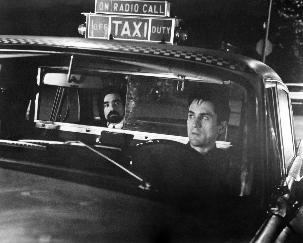 Scorsese rides in the back seat of a cab as he plays a role in his 1976 film "Taxi Driver." De Niro played the main character, Travis Bickle.