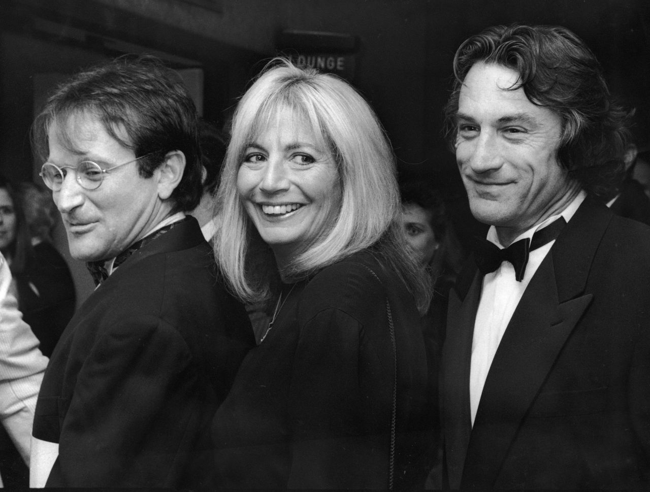 De Niro attends the 1990 premiere of "Awakenings" with director Penny Marshall and actor Robin Williams.