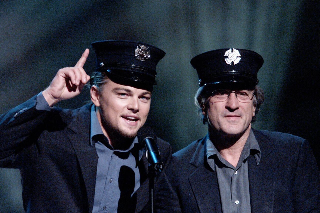 Leonardo DiCaprio and De Niro speak at a New York City concert benefiting 9/11 victims in 2001.