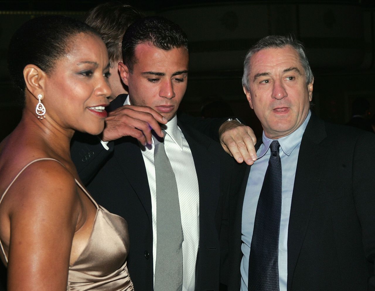 De Niro is joined by his second wife, actress Grace Hightower, and his son Raphael at a 2004 cocktail party for the Directors Guild of America.