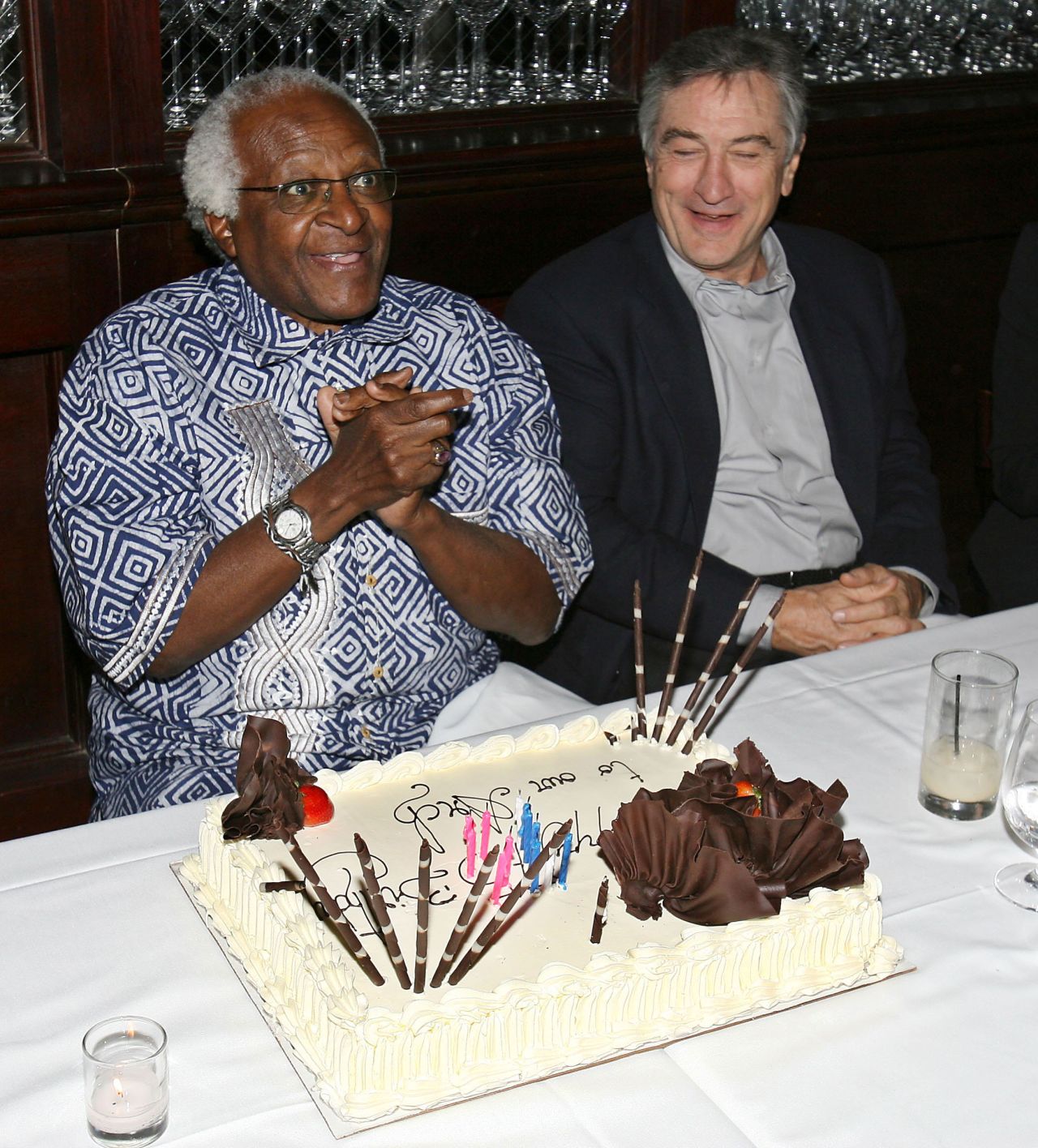 De Niro sits with Archbishop Desmond Tutu, who was celebrating his 75th birthday at the Tribeca Grill in New York in 2006.
