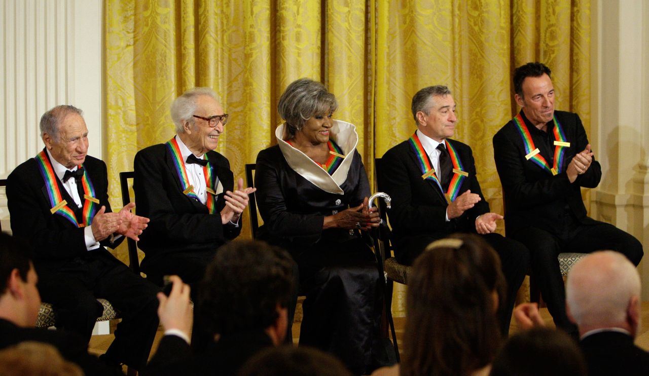 De Niro and other Kennedy Center honorees applaud President Obama at a White House reception in 2009. From left are film director Mel Brooks, jazz musician Dave Brubeck, opera singer Grace Bumbry, De Niro and rock star Bruce Springsteen.