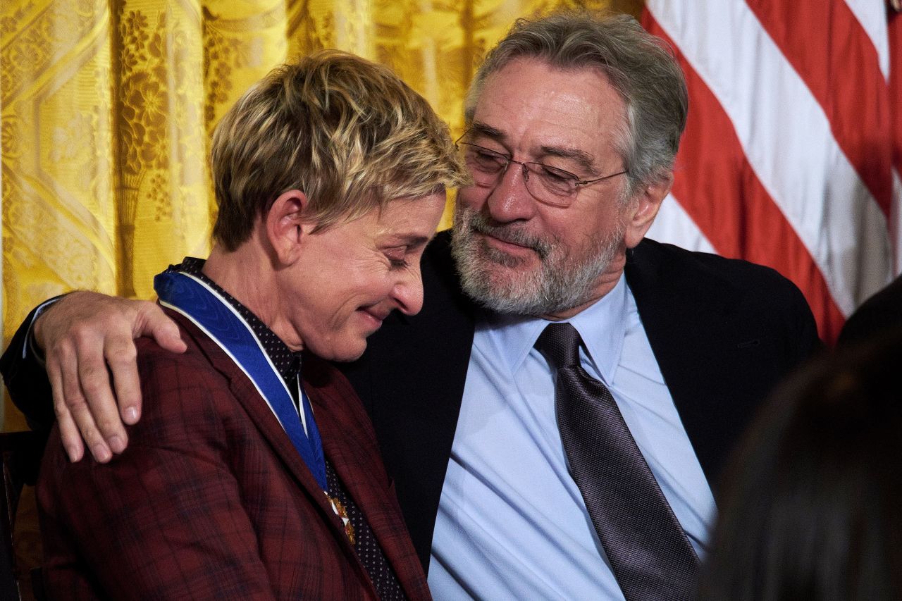 De Niro embraces Ellen DeGeneres at a White House ceremony in 2016. They received the Presidential Medal of Freedom, the nation's highest civilian honor. "While the name De Niro is synonymous with 'tough guy,' his true gift is the sensitivity that he brings to each role," President Obama said. "This son of New York artists didn't stop at becoming one of the world's greatest actors. He's also a director, a philanthropist, co-founder of the Tribeca Film Festival. Of his tireless preparation — from learning the saxophone to remaking his body — he once said, 'I feel I have to earn the right to play a part.' And the result is honest and authentic art that reveals who we really are."