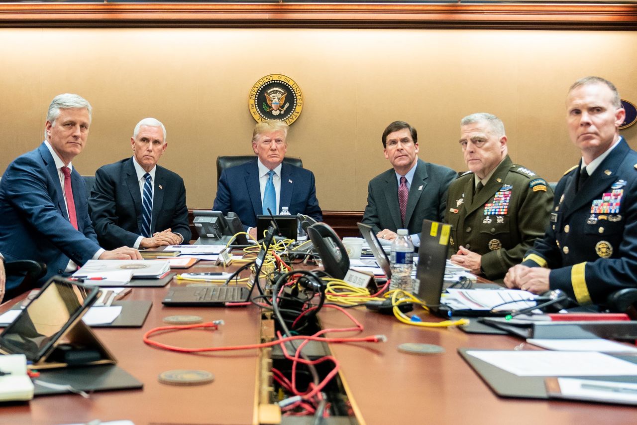 In this photo released by the White House, President Trump sits in the White House Situation Room, monitoring developments in the October 2019 military raid that killed ISIS leader Abu Bakr al-Baghdadi in northwest Syria. From left are national security adviser Robert O'Brien; Pence; Trump; Defense Secretary Mark Esper; Gen. Mark Milley, the chairman of the Joint Chiefs of Staff; and Brig. Gen. Marcus Evans, the deputy director for special operations on the Joint Staff.