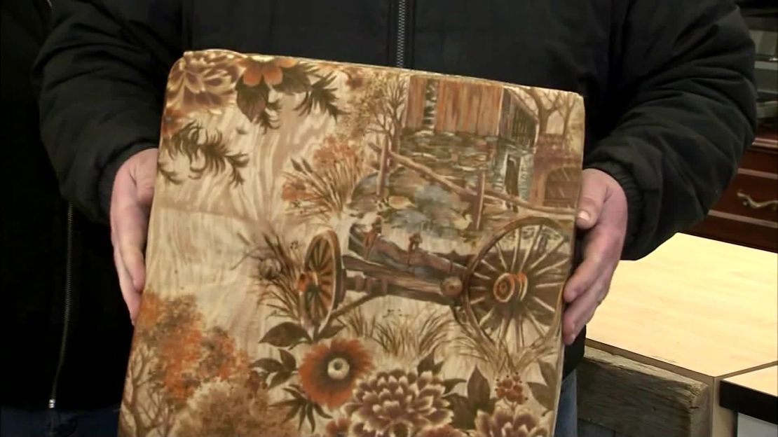 The ottoman cushion that contained the cash.