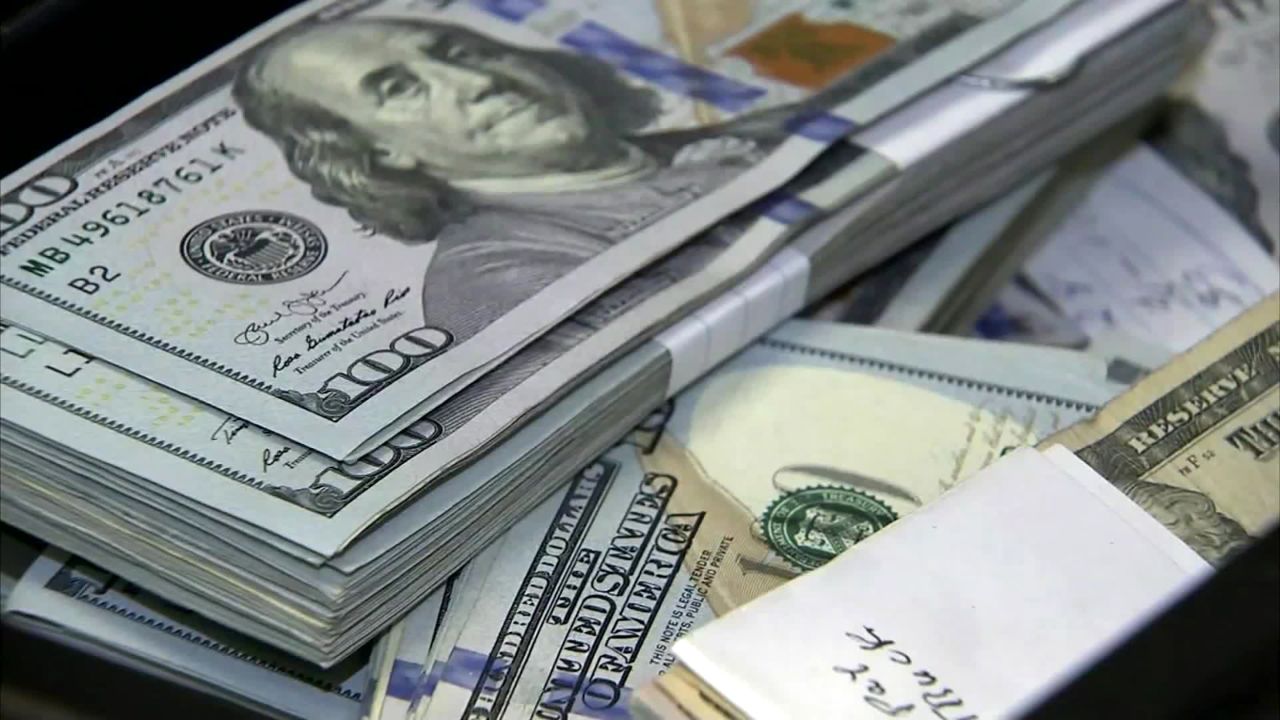 Inside the footstool cushion were bundles of cash, some with notes attached, totaling $43,170.