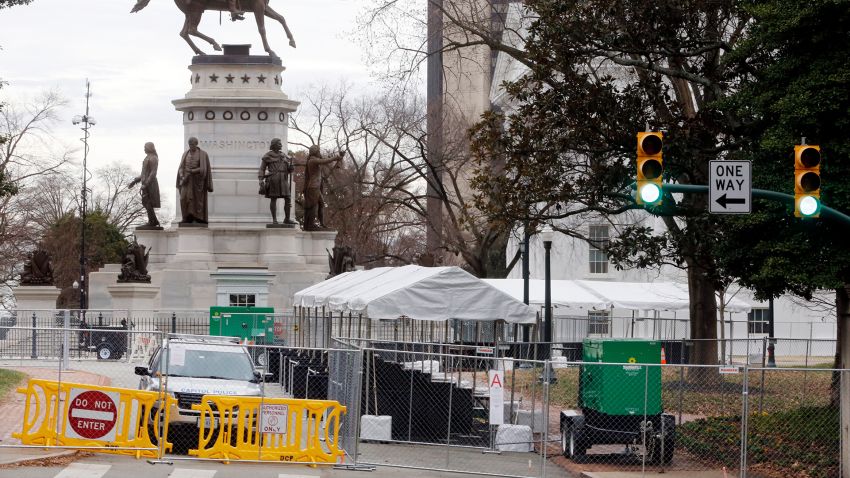 Barriers are set up at the Virginia State Capitol in Richmond on Saturday, Jan. 18, 2019, in anticipation of a rally by a large number of gun-rights backers on Monday. An unprecedented show of force by gun-rights activists is expected on Monday in Virginia. They are angry over the state's new Democratic majority leadership and its plans to enact a slew of gun restrictions. Thousands of gun activists are expected to turn out. Second Amendment groups have identified the state as a rallying point for the fight against what they see as a national erosion of gun rights. (Joe Mahoney/Richmond Times-Dispatch via AP)
