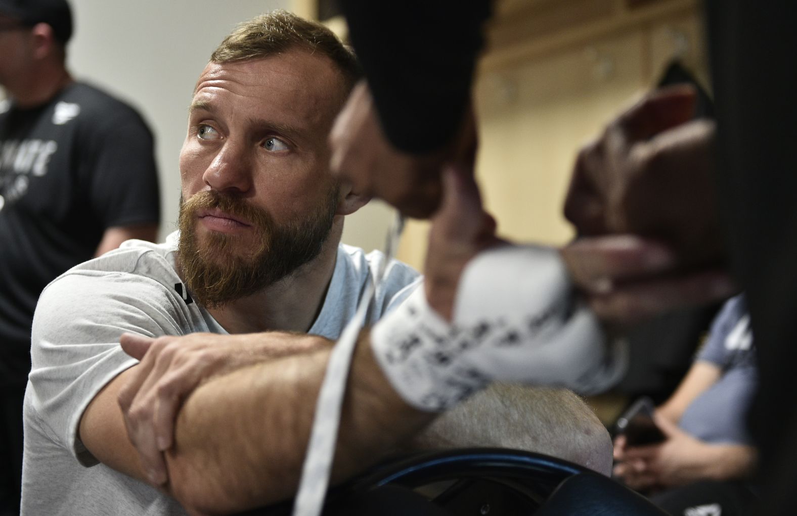 Cerrone has his hands taped.