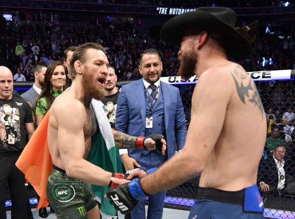 McGregor and Cerrone shake hands after their welterweight fight.