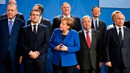 (Front row, L to R) Turkish President Recep Tayyip Erdogan, French President Emmanuel Macron, German Chancellor Angela Merkel and Secretary-General of the United Nations (UN) Antonio Guterres and Russian President Vladimir Putin, (second row, L to R) European Council President Charles Michel, German Foreign Minister Heiko Maas, US Secretary of State Mike Pompeo, member of China's political bureau Yang Jiechi and President of the European Commission Ursula von der Leyen pose for a family picture during a Peace summit on Libya at the Chancellery in Berlin, on January 19, 2020. - World leaders gather in Berlin on January 19, 2020 to make a fresh push for peace in Libya, in a desperate bid to stop the conflict-wracked nation from turning into a "second Syria". Chancellor Angela Merkel will be joined by the presidents of Russia, Turkey and France and other world leaders for talks held under the auspices of the United Nations. (Photo by Tobias SCHWARZ / AFP) (Photo by TOBIAS SCHWARZ/AFP via Getty Images)