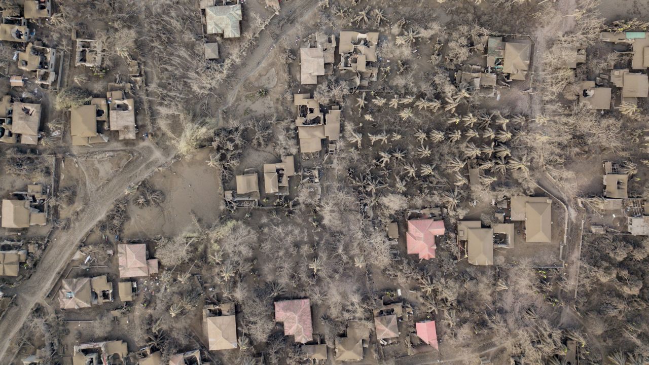 The landscape of Buso Buso is covered in ash on Sunday, January 19.