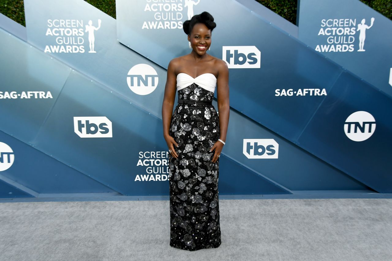 Lupita Nyong'o walks the red carpet before the the 26th Screen Actors Guild Awards at The Shrine Auditorium in Los Angeles on Sunday, January 19.