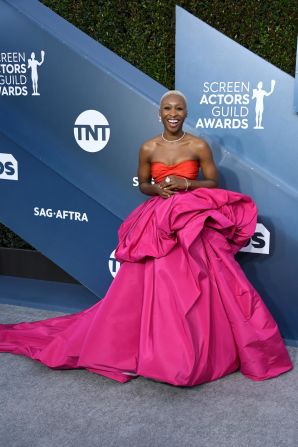 "Harriet" star Cynthia Erivo attends the 26th SAG Awards in a bright red and hot pink strapless dress by Schiaparelli.