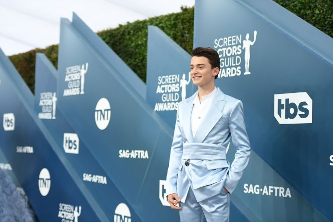 "Stranger Things" actor Noah Schnapp  was among those who wore more daring menswear choices. Schnapp chose a silk suit by Balmain. 