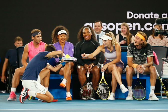 Novak Djokovic serves drinks during the Rally for Relief Bushfire Appeal event on Wednesday, January 15, in Melbourne, Australia. 