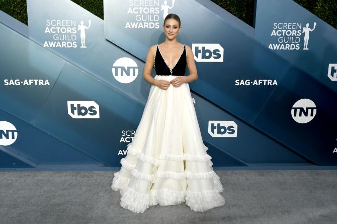 "Hustlers" star Lili Reinhart in a black and white Miu Miu gown with pearl accents.
