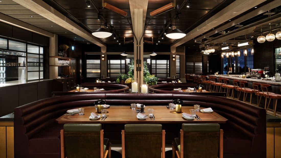 <strong>HENRY, Hong Kong:</strong> The interior features leather banquettes and polished brass along with a marble bar that leads to a terrace for cocktails, fine wines or cigars.
