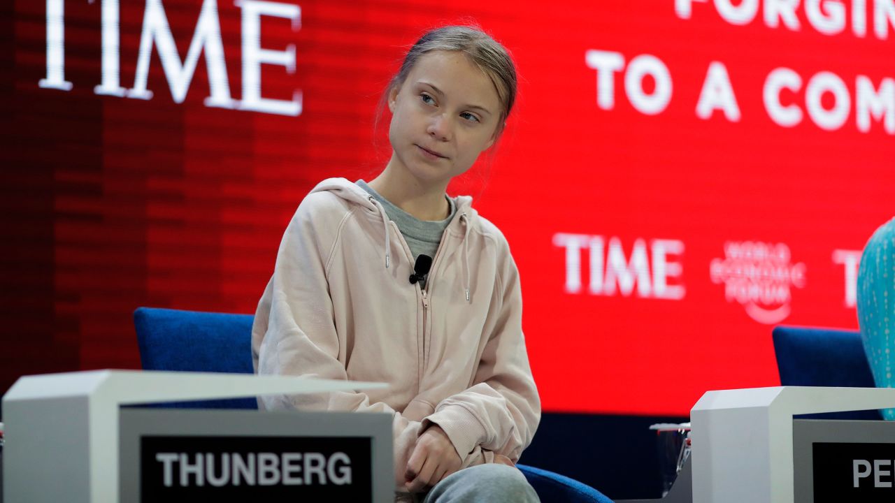 Swedish environmental activist Greta Thunberg takes her seat prior to the opening session of the World Economic Forum in Davos, Switzerland, Tuesday, Jan. 21, 2020. The 50th annual meeting of the forum will take place in Davos from Jan. 20 until Jan. 24, 2020. (AP Photo/Markus Schreiber)