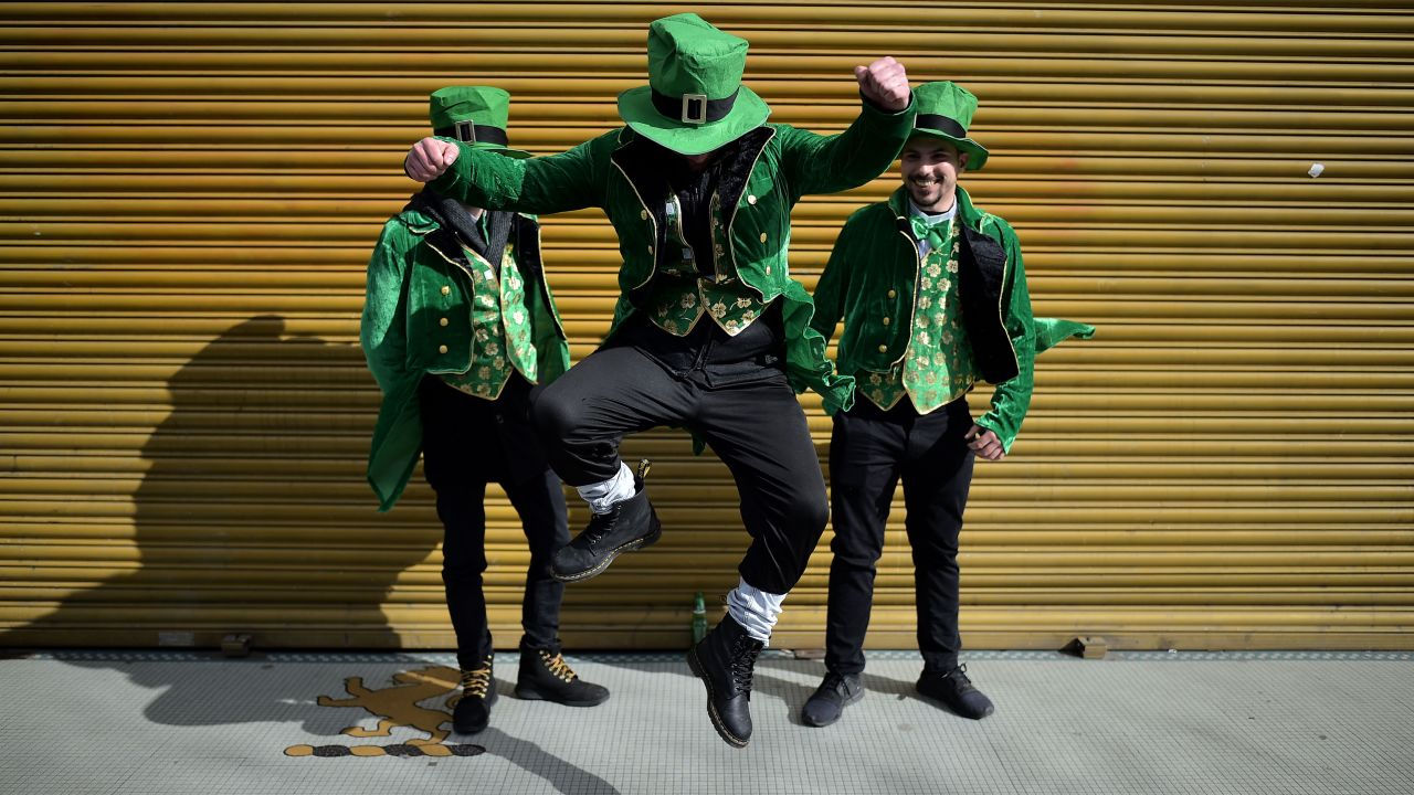 <strong>Dublin:</strong> Revelers attend the Saint Patrick's Day parade on March 17, 2019. According to legend, Patrick used the three-leaved shamrock to explain the Holy Trinity to Irish pagans in the fifth century.