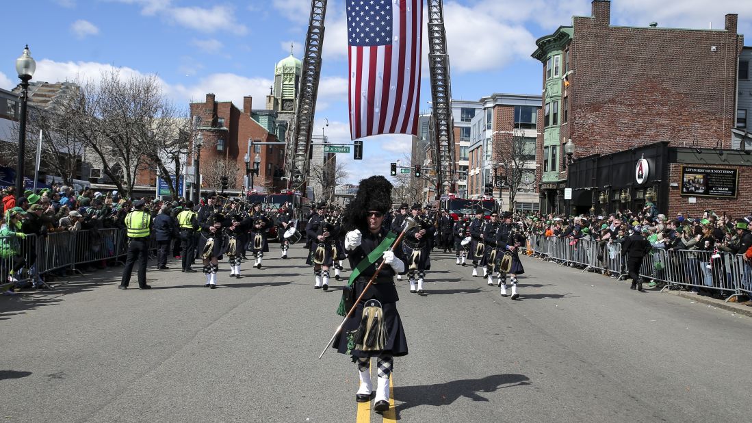 <strong>Boston:</strong> A pipes and drum band marches during the annual St. Patrick's Day parade in South Boston on March 17, 2019. Click through the gallery for more parade photos from Boston and other cities around the world through the years: 