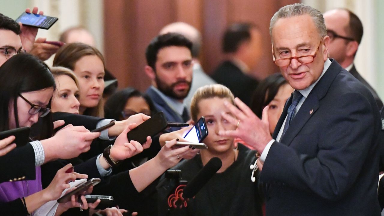 US Senate Minority Leader Chuck Schumer (D-NY) speaks to reporters during the first day of the Senate impeachment trial of US President Donald Trump at the US Capitol in Washington, DC, January 21, 2020. - Sparks flew Tuesday over proposed rules for the Senate trial of President Donald Trump, as Democrats accused Republicans of attempting a "cover-up" of evidence that the US leader abused his powers. The first full day of the historic trial saw the Republican Senate leader Mitch McConnell submit a resolution on procedures that does not admit evidence from the investigation of the president. (Photo by Mandel NGAN / AFP) (Photo by MANDEL NGAN/AFP via Getty Images)