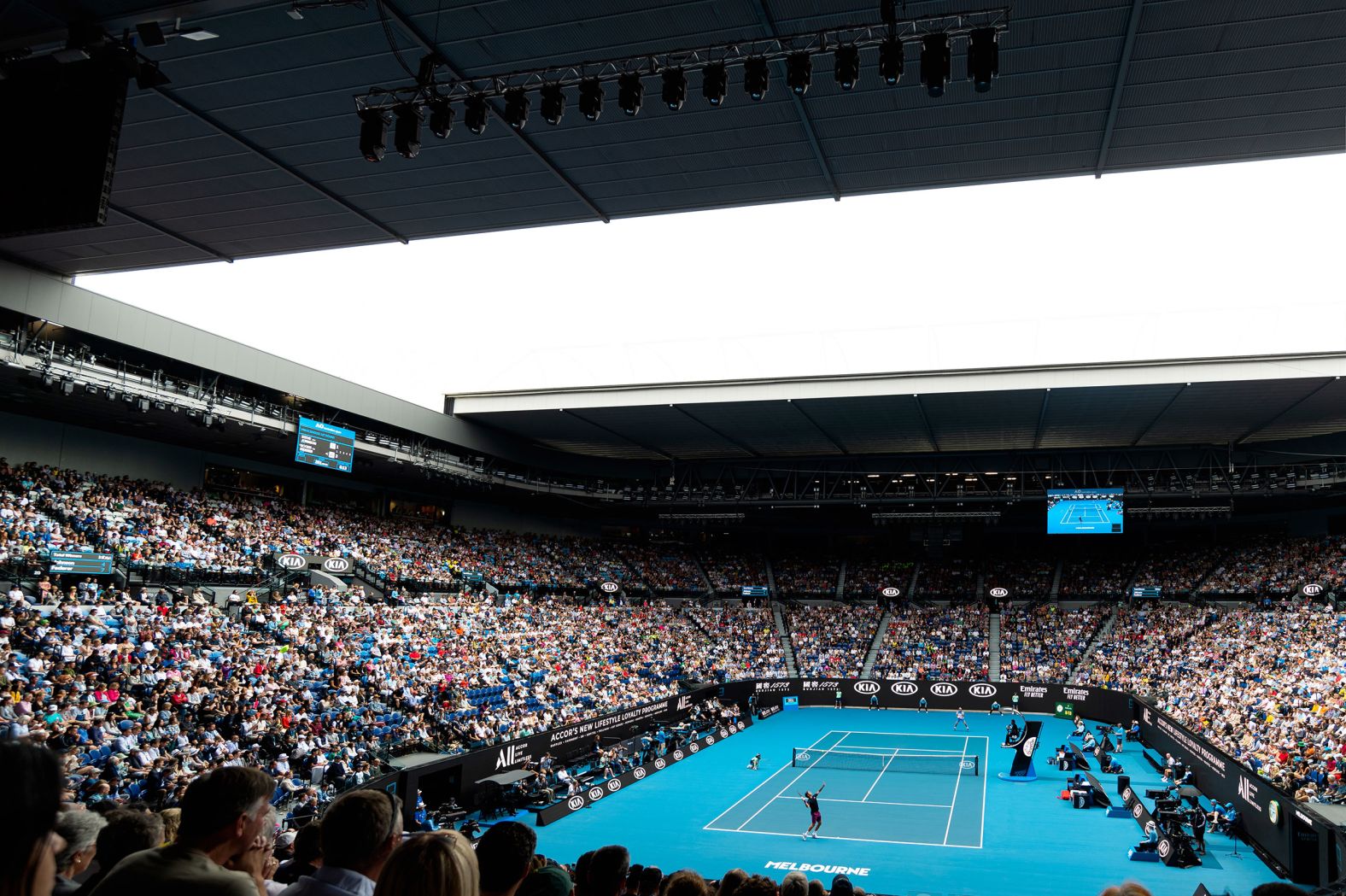 A packed Rod Laver Arena looks on as Roger Federer gets his campaign underway against Steve Johnson. Federer has won here six times -- one fewer than Djokovic.