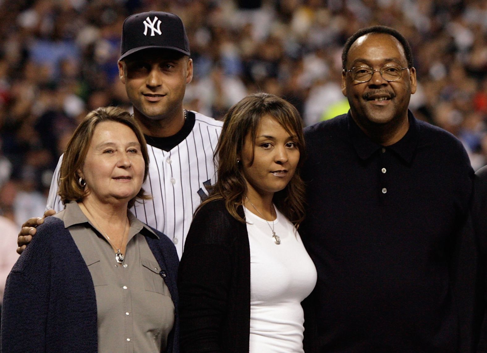 Jeter is seen with his mother, Dorothy; his sister, Sharlee; and his father, Charles, before the final regular-season game at the old Yankee Stadium in September 2008.