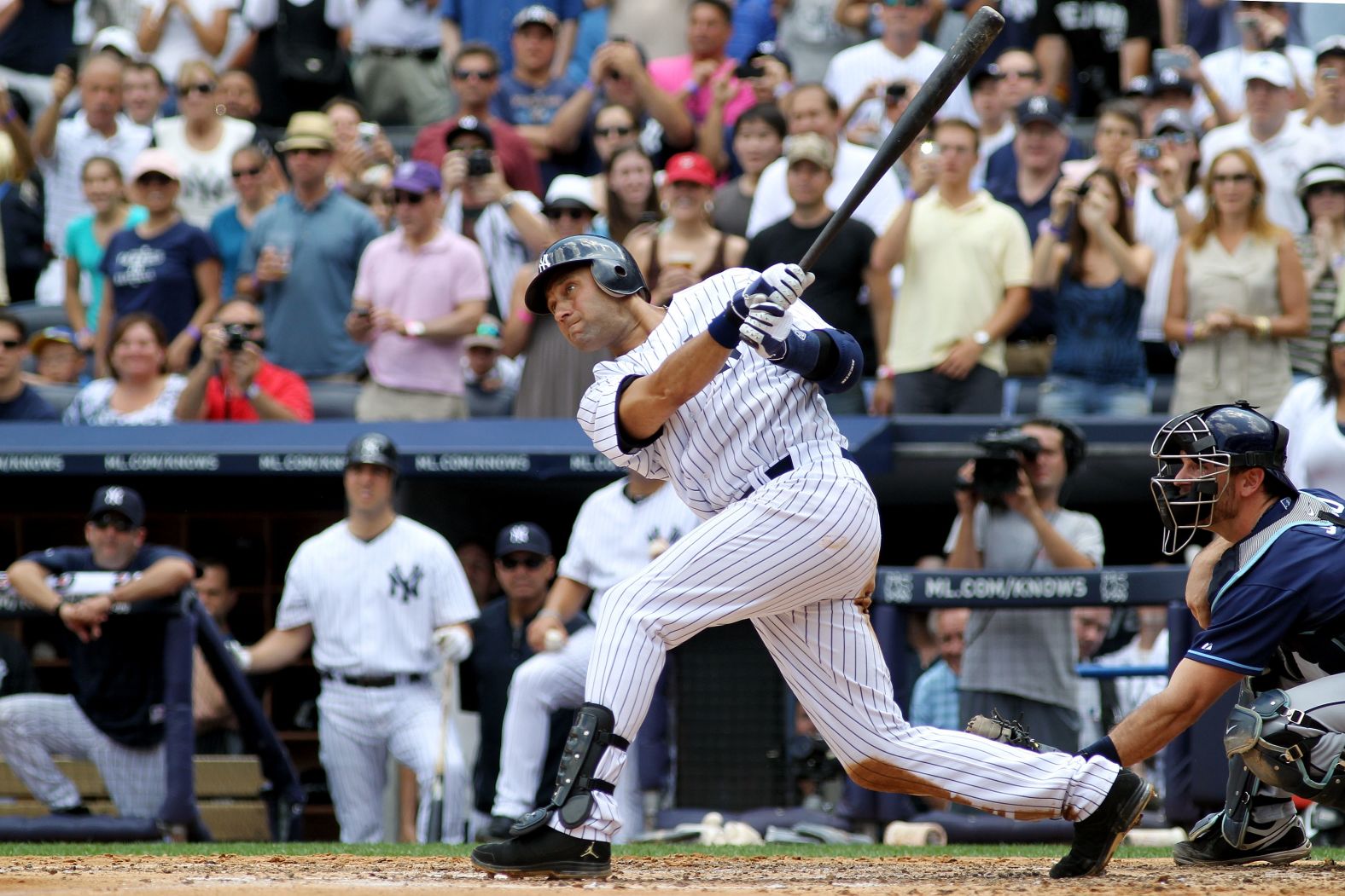 Jeter connects on a solo home run for his 3,000th career hit on July 9, 2011. He was the 28th player in Major League history to reach the milestone.