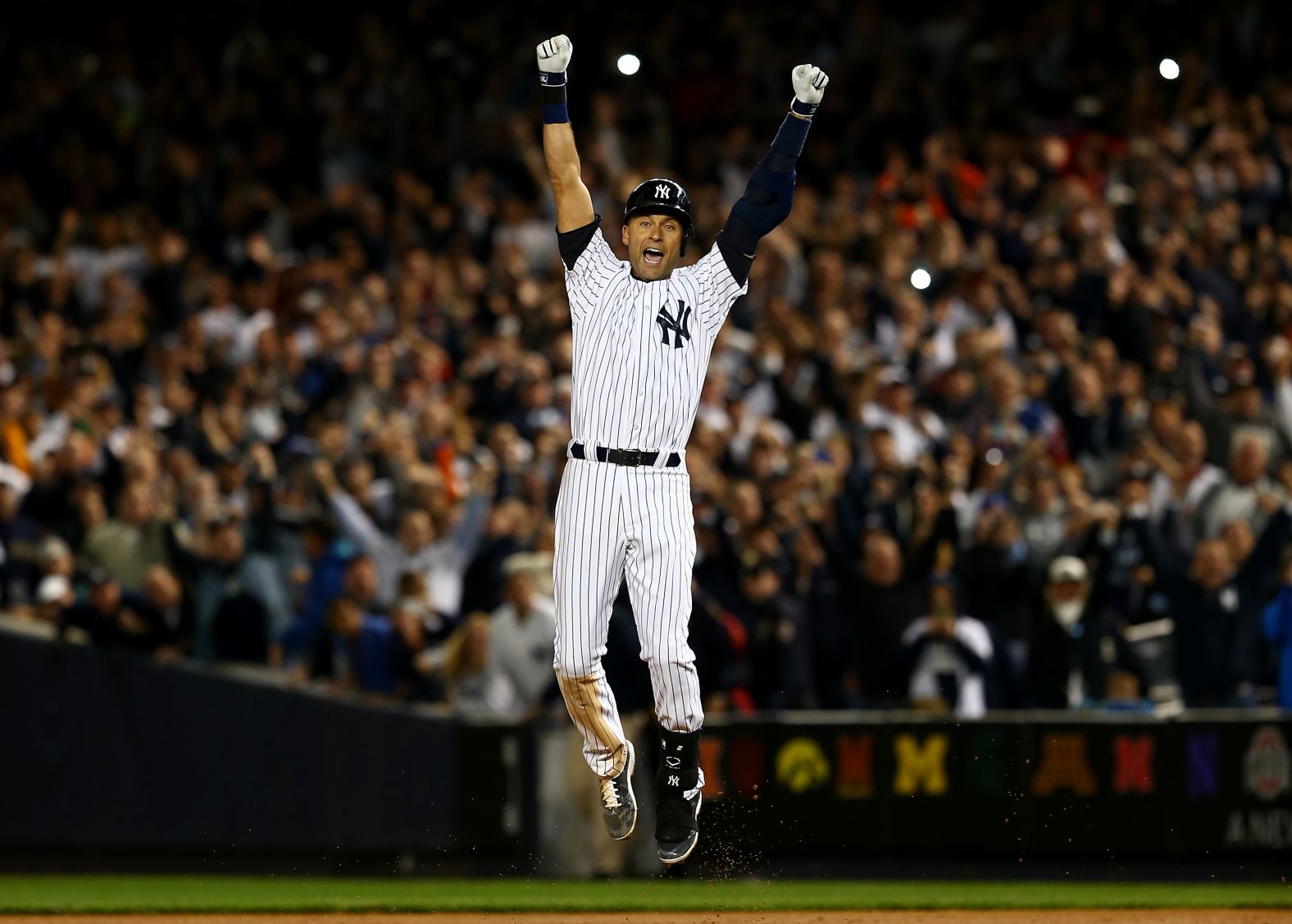 Jeter celebrates after hitting the game-winning RBI in his last game at Yankee Stadium. "I don't think there's a more fitting way for it to end," Yankees manager Joe Girardi said.