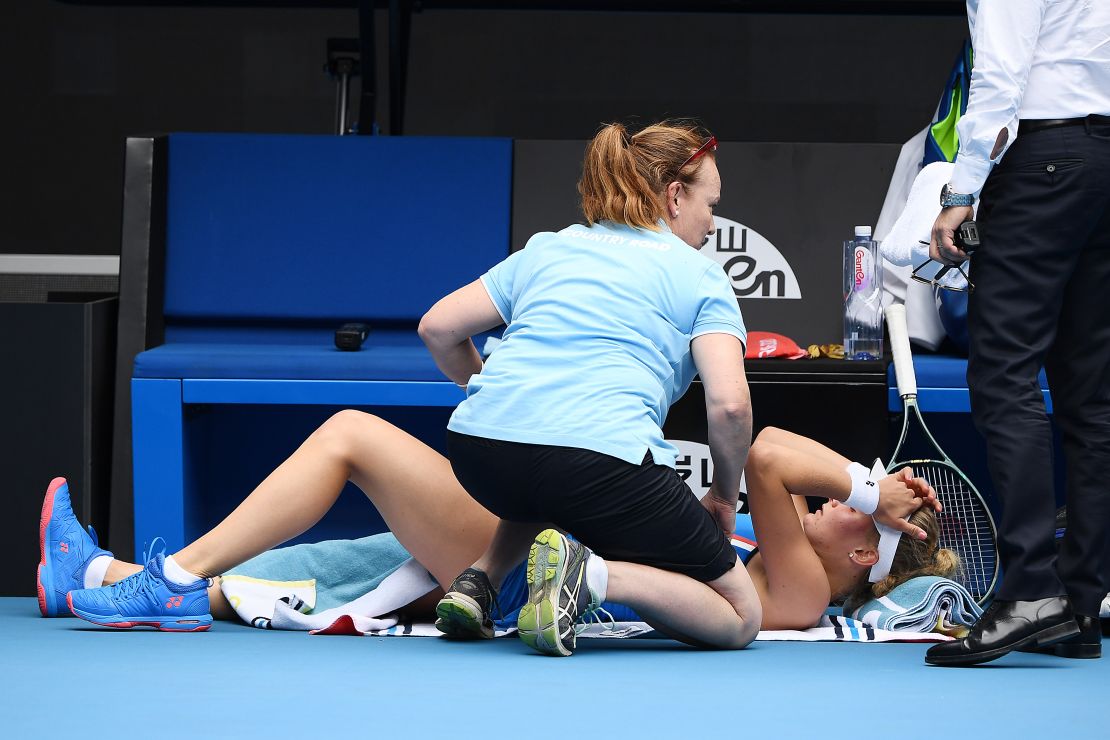 Dayana Yastremska receives medical treatment against Caroline Wozniacki.