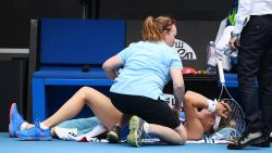 MELBOURNE, AUSTRALIA - JANUARY 22: Dayana Yastremska of Ukraine receives medical treatment during her Women's Singles second round match against Caroline Wozniacki of Denmark on day three of the 2020 Australian Open at Melbourne Park on January 22, 2020 in Melbourne, Australia. (Photo by Quinn Rooney/Getty Images)