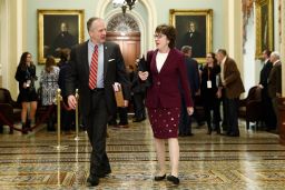 Sen. Susan Collins of Maine, at right, walks with Sen. Dan Sullivan of Alaska to the Senate chamber at the Capitol on Wednesday.