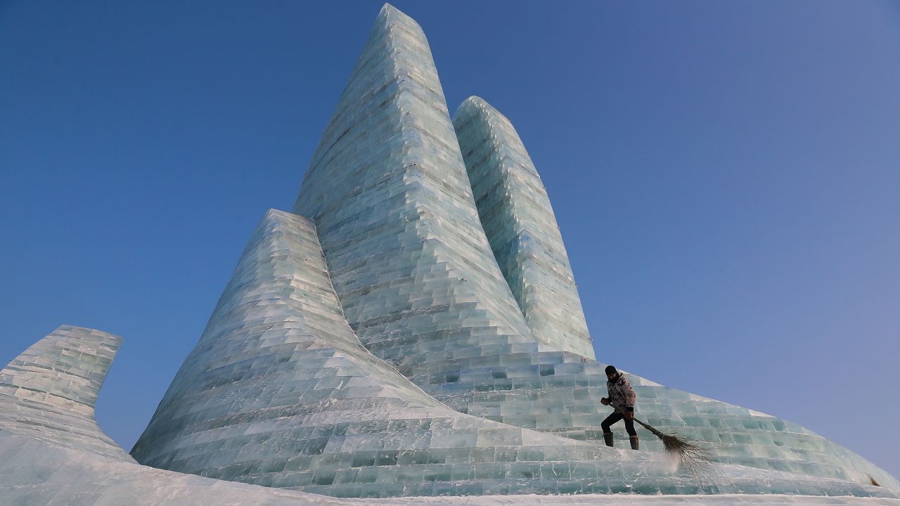 <strong>Harbin, China:</strong> At the Harbin International Ice and Snow Sculpture Festival in January, which billed as the world's largest winter festival, a worker maintains one of many intricate sculptures.