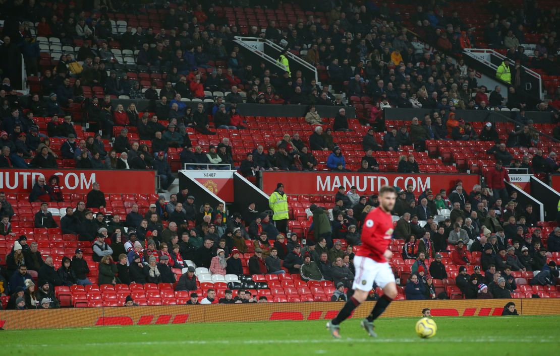 Empty seats are seen around Old Trafford during the match between Manchester United and Burnley.
