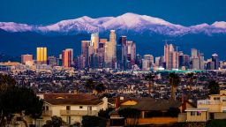 City of Angeles, Los Angeles Skyline framed by San Bernadino Mountains and Mount Baldy with fresh snow from Kenneth Hahn State Park. (Photo by: Visions of America/Education Images/Universal Images Group via Getty Images)