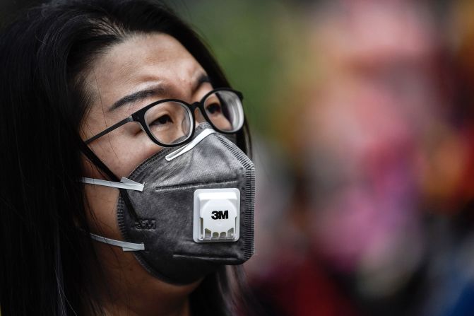 People in Guangzhou, China, wear protective masks on January 22, 2020.