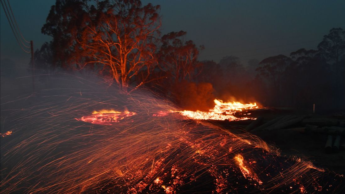 Flying embers are seen in this long-exposure photo from Moruya on Thursday, January 23.