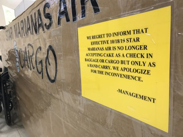 <strong>No cake allowed: </strong>A sign at the Tinian airport cargo desk lets passengers know they can't ship cakes as cargo.