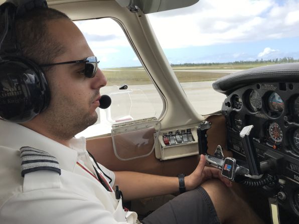 <strong>10-mile flight: </strong>Star Marinas pilot Matan Chen, a 33-year-old originally from Israel, gets ready for takeoff on the short Tinian-Saipan flight.