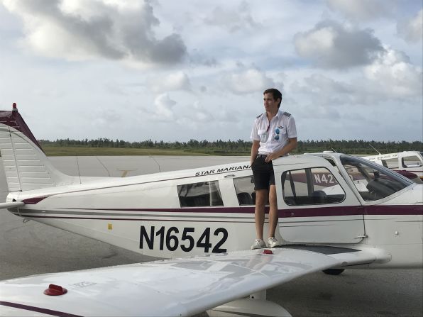 <strong>Ready for boarding: </strong>Star Marianas Air pilot Kai Frenay waits for passengers to board his plane at Tinian airport. 