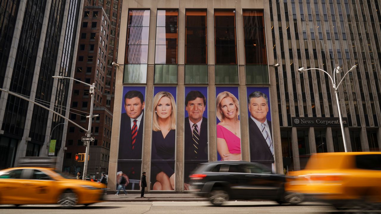 NEW YORK, NY - MARCH 13: Traffic on Sixth Avenue passes by advertisements featuring Fox News personalities, including Bret Baier, Martha MacCallum, Tucker Carlson, Laura Ingraham, and Sean Hannity, adorn the front of the News Corporation building, March 13, 2019 in New York City. On Wednesday the network's sales executives are hosting an event for advertisers to promote Fox News. Fox News personalities Tucker Carlson and Jeanine Pirro have come under criticism in recent weeks for controversial comments and multiple advertisers have pulled away from their shows. (Photo by Drew Angerer/Getty Images)