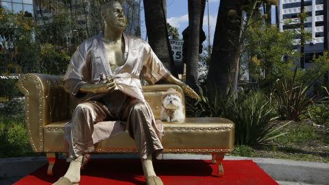One of the artists behind the "Casting Couch" statue of Harvey Weinstein said it was meant to shine a light on the entertainment industry's sexual misconduct crisis.