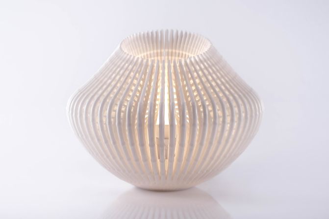 The collective also produce smaller pieces, such as this 3D-printed lamp. 