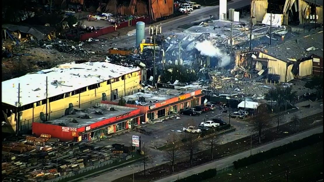 Smoke rises Friday morning from the site of an explosion that happened hours earlier in northwest Houston.