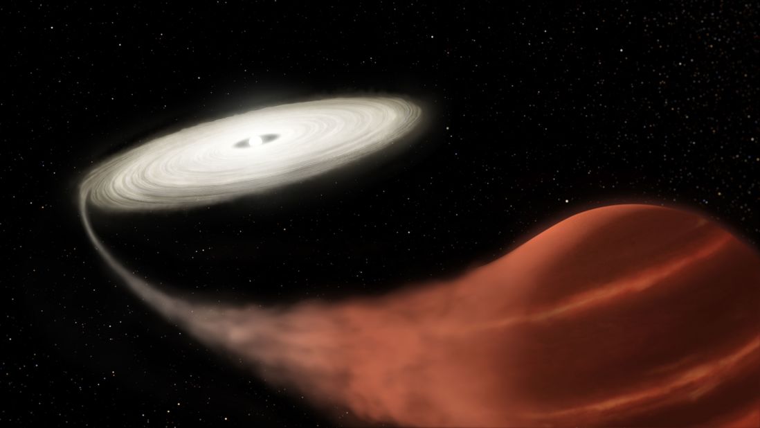A white dwarf, left, is pulling material off of a brown dwarf, right, about 3,000 light-years from Earth.