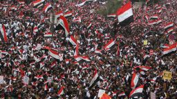 Thousands of Iraqis, waving national flags, take to the streets in central Baghdad on January 24, 2020 to demand the ouster of US troops from the country. - Thousands of supporters of volatile Iraqi cleric Moqtada Sadr gathered in the Iraqi capital on Friday for a "million-strong" march to demand an end to the presence of US forces in Iraq, putting the protest-hit capital on edge. The march has rattled the separate, months-old protest movement that has gripped Baghdad and the Shiite-majority south since October, demanding a government overhaul, early elections and more accountability. (Photo by AHMAD AL-RUBAYE / AFP) (Photo by AHMAD AL-RUBAYE/AFP via Getty Images)