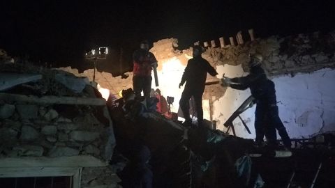 Teams conduct search operations for survivors of a collapsed building in Malatya province.