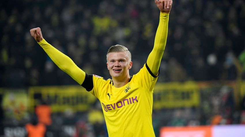 Dortmund's Norwegian forward Erling Braut Haaland celebrates scoring during the German first division Bundesliga football match Borussia Dortmund v FC Cologne in Dortmund, on January 24, 2020. (Photo by Ina FASSBENDER / AFP) / DFL REGULATIONS PROHIBIT ANY USE OF PHOTOGRAPHS AS IMAGE SEQUENCES AND/OR QUASI-VIDEO (Photo by INA FASSBENDER/AFP via Getty Images)